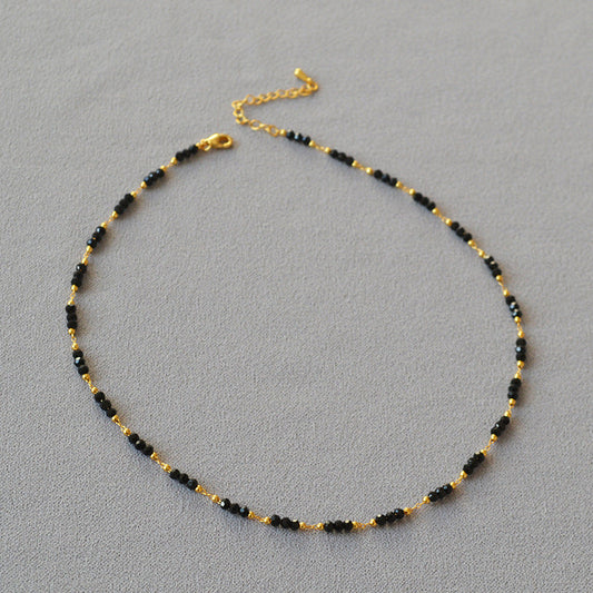 Black Beaded Necklace with Gold Accents